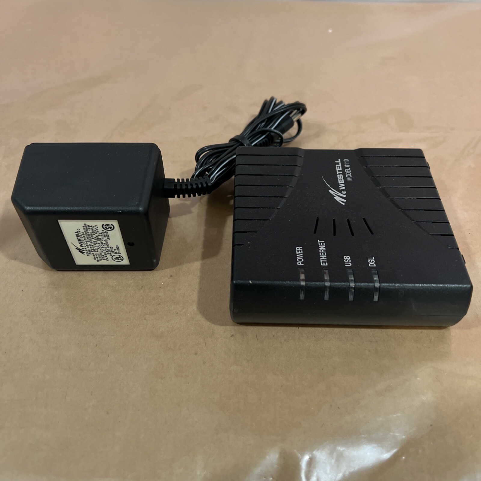 WESTELL 6110 E90-611016-06 DSL MODEM UNIT WITH POWER SUPPLY