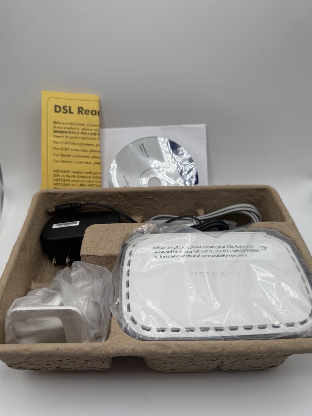 Netgear DM111PSP Broadband ADSL2+ DSL Modem – Complete with Accessories