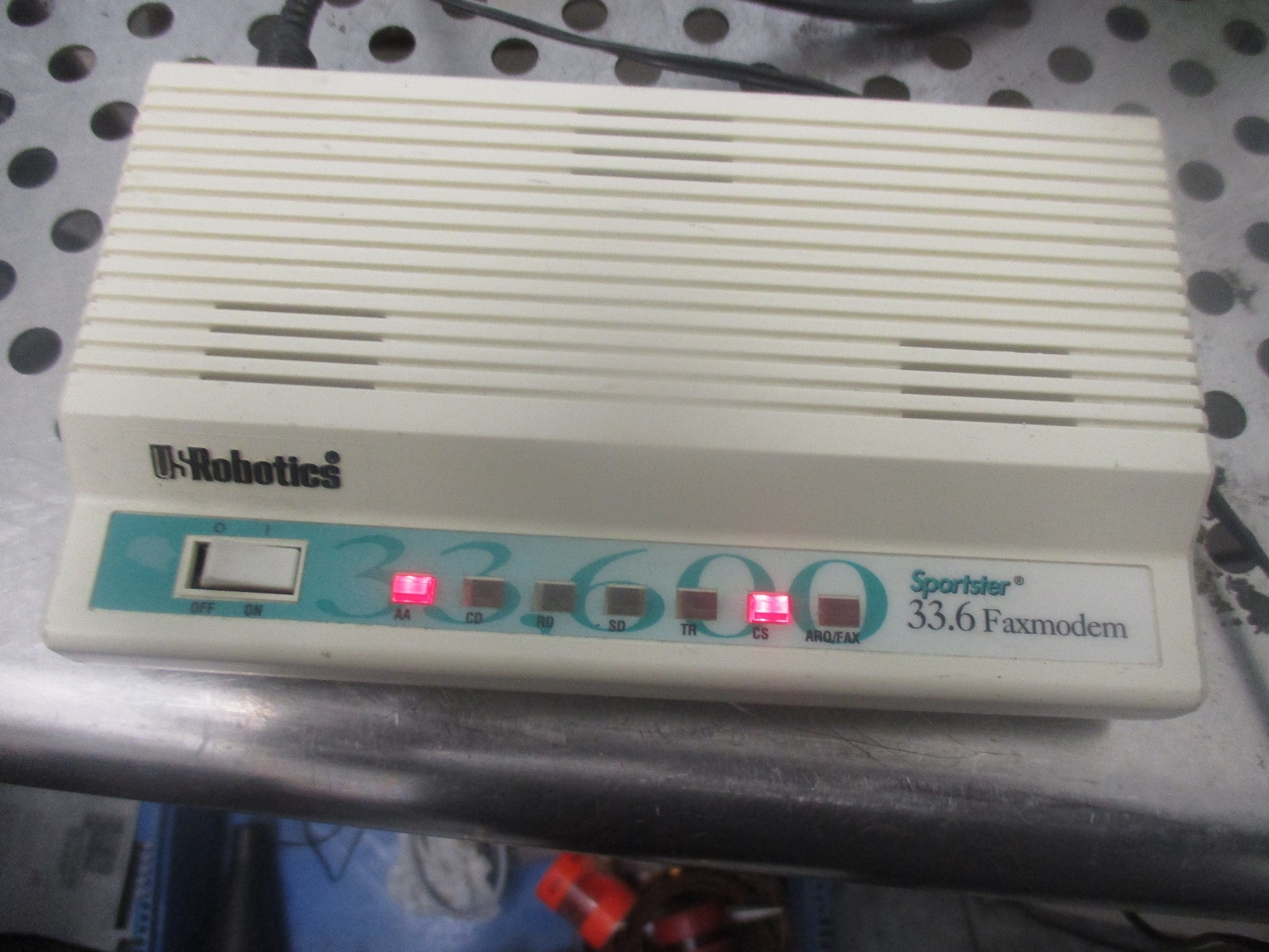 U.S.Robotics Sportster 33.6 Faxmodem with Adapter. Product Number: 000839-09