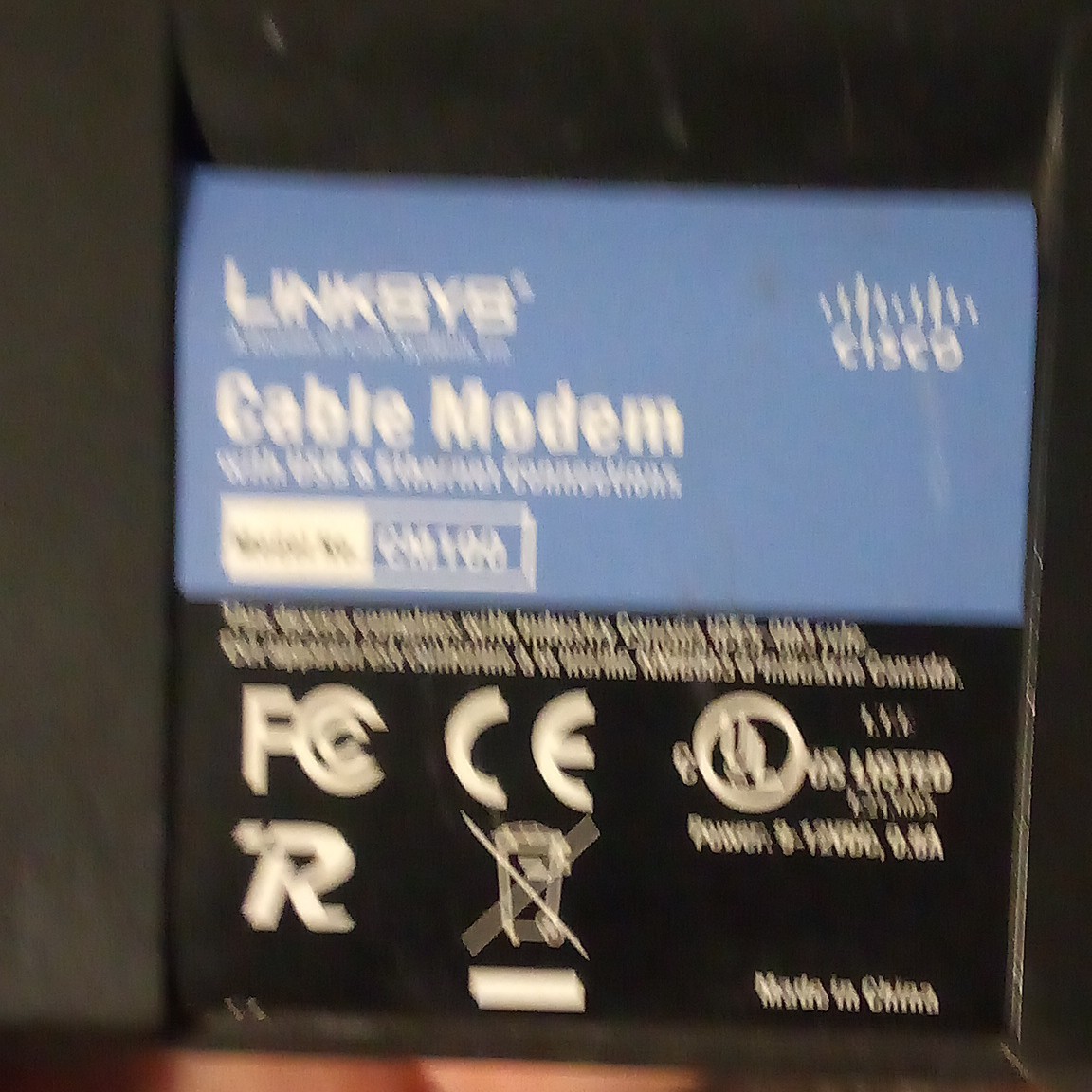 Linksys CM100 DOCSIS 2.0 Cable Modem 100 Mbps USB/Ethernet Black AD12V/1A-SW