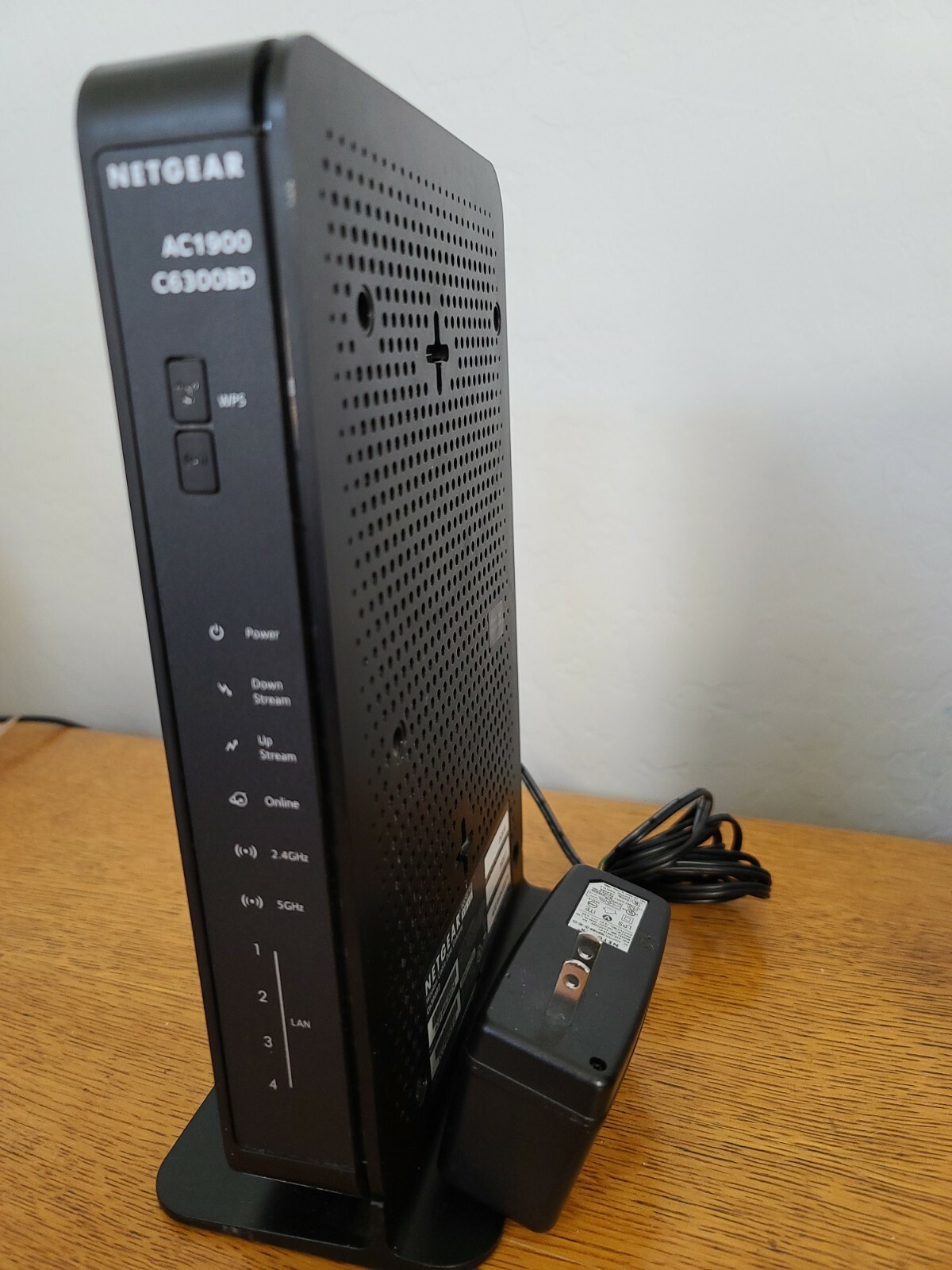 The NETGEAR AC1900 C6300BD is a cable modem router that provides high-speed