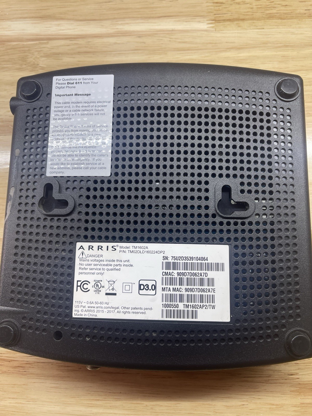 ARRIS TM1602A Cable Modem DOCSIS 3.0 with power cord.