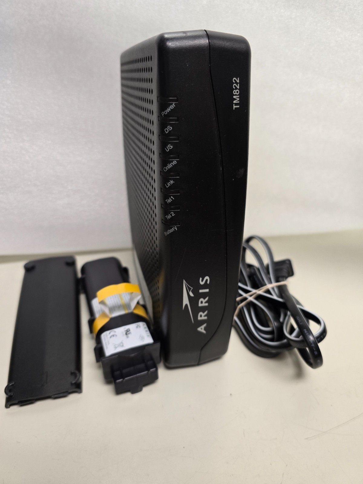 ARRIS Touchstone TM822G Telephony Modem W/ power cable and battery.