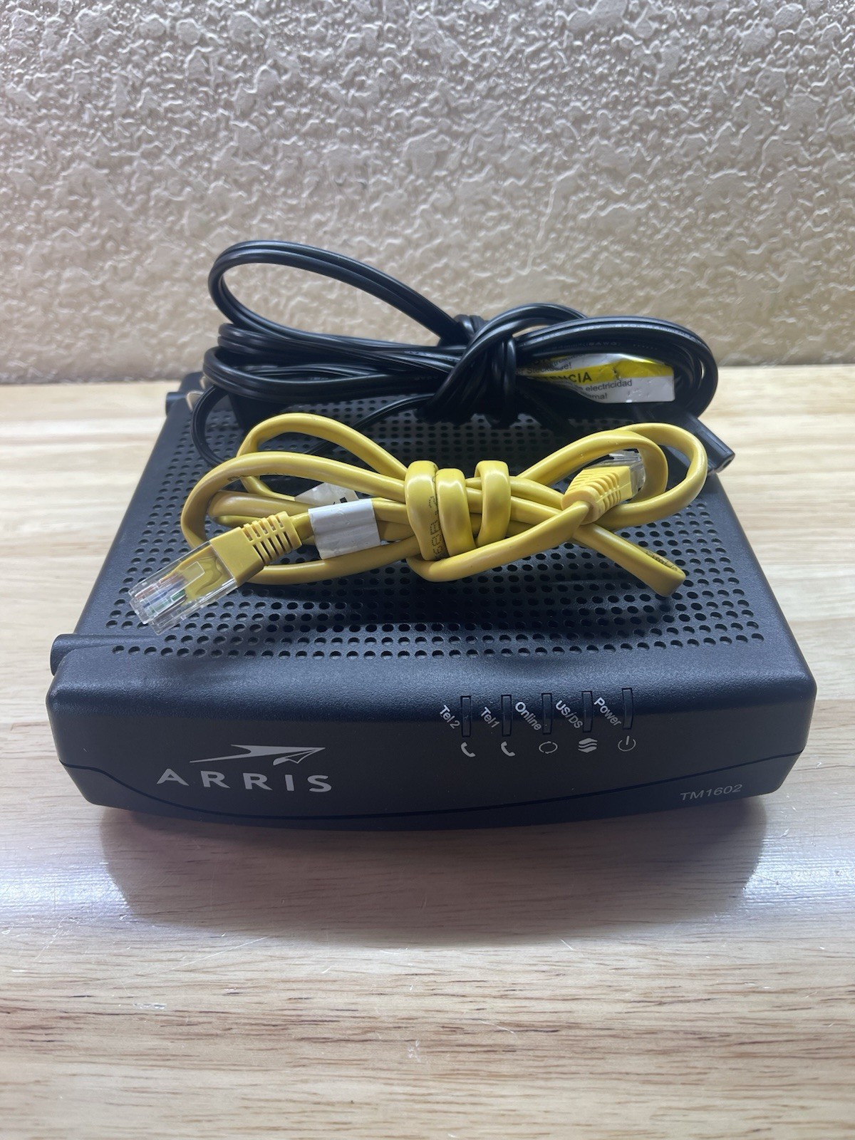 ARRIS TM1602A Cable Modem DOCSIS 3.0 with power cord.