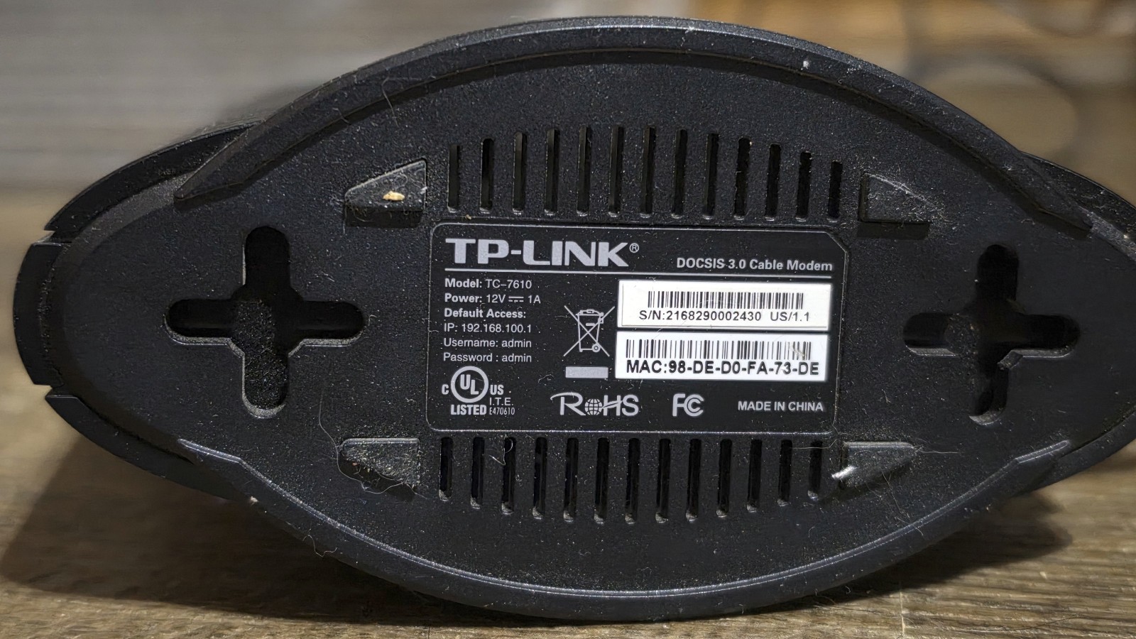 TP-LINK TC-7610 DOCSIS 3.0 Cable Modem with power adapter.