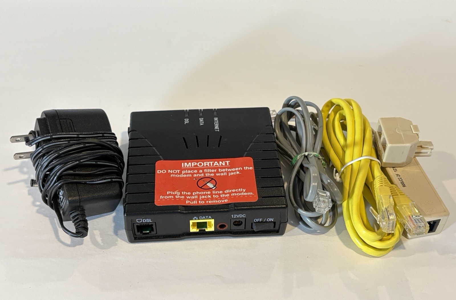 WESTELL G90-610015-20 ADSL2+ MODEM ( W/CORD & CABLES)