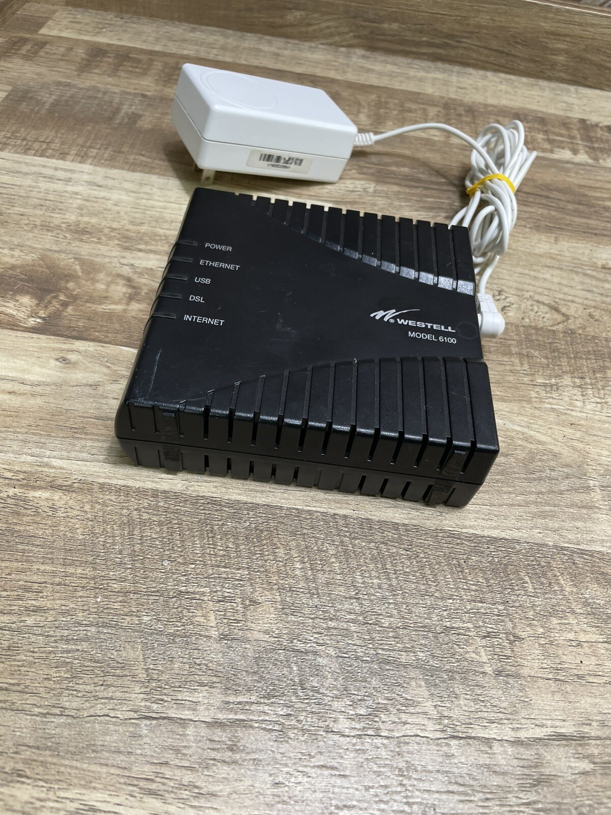 WESTELL DSL MODEM WITH POWER SUPPLY ~ MODEL #: E90-610014-06 Rev: E Wind River