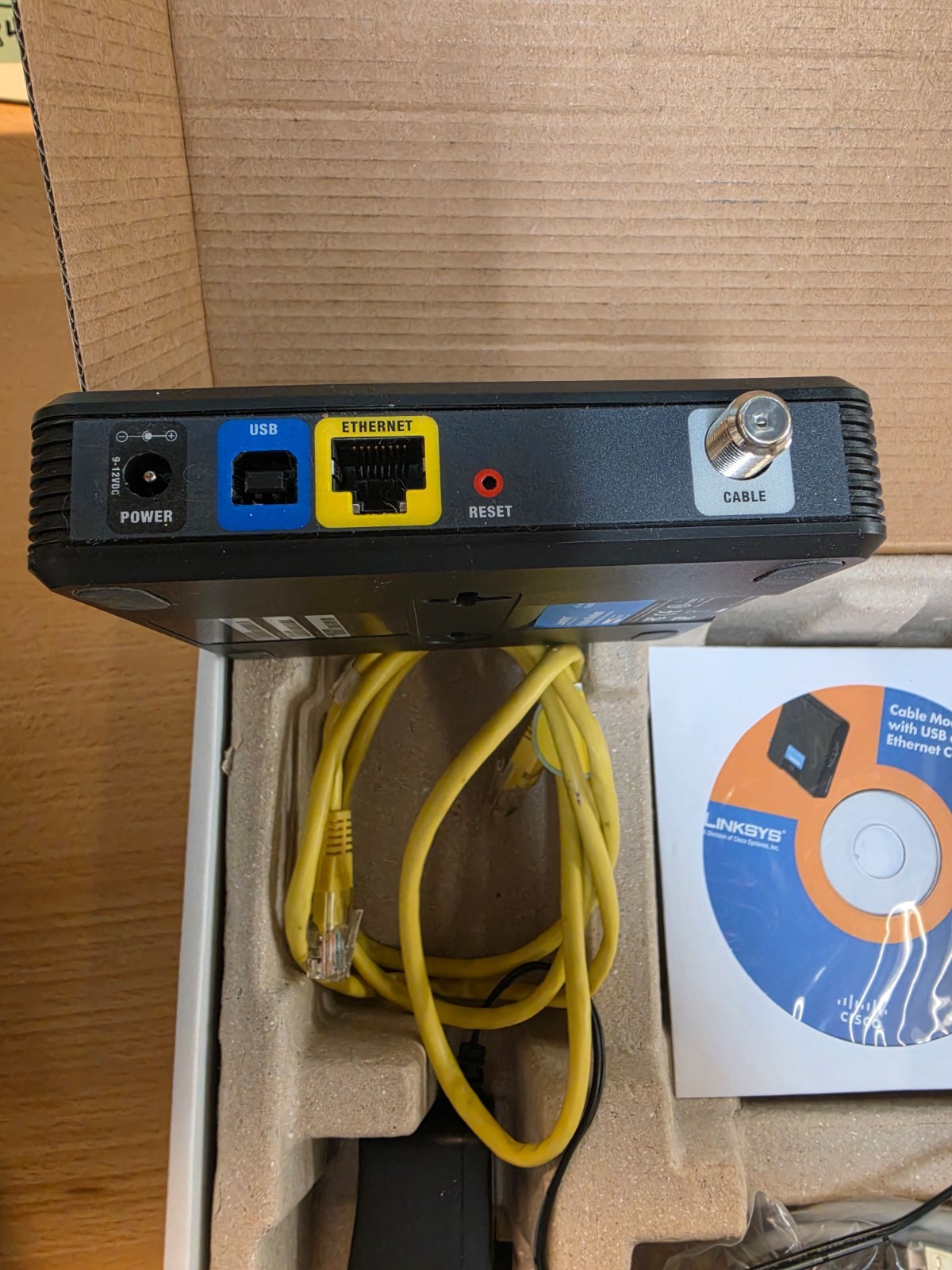 LINKSYS CISCO CM100 DOCSIS 2.0 CABLE MODEM COMPLETE IN BOX w/CD CABLES MANUAL