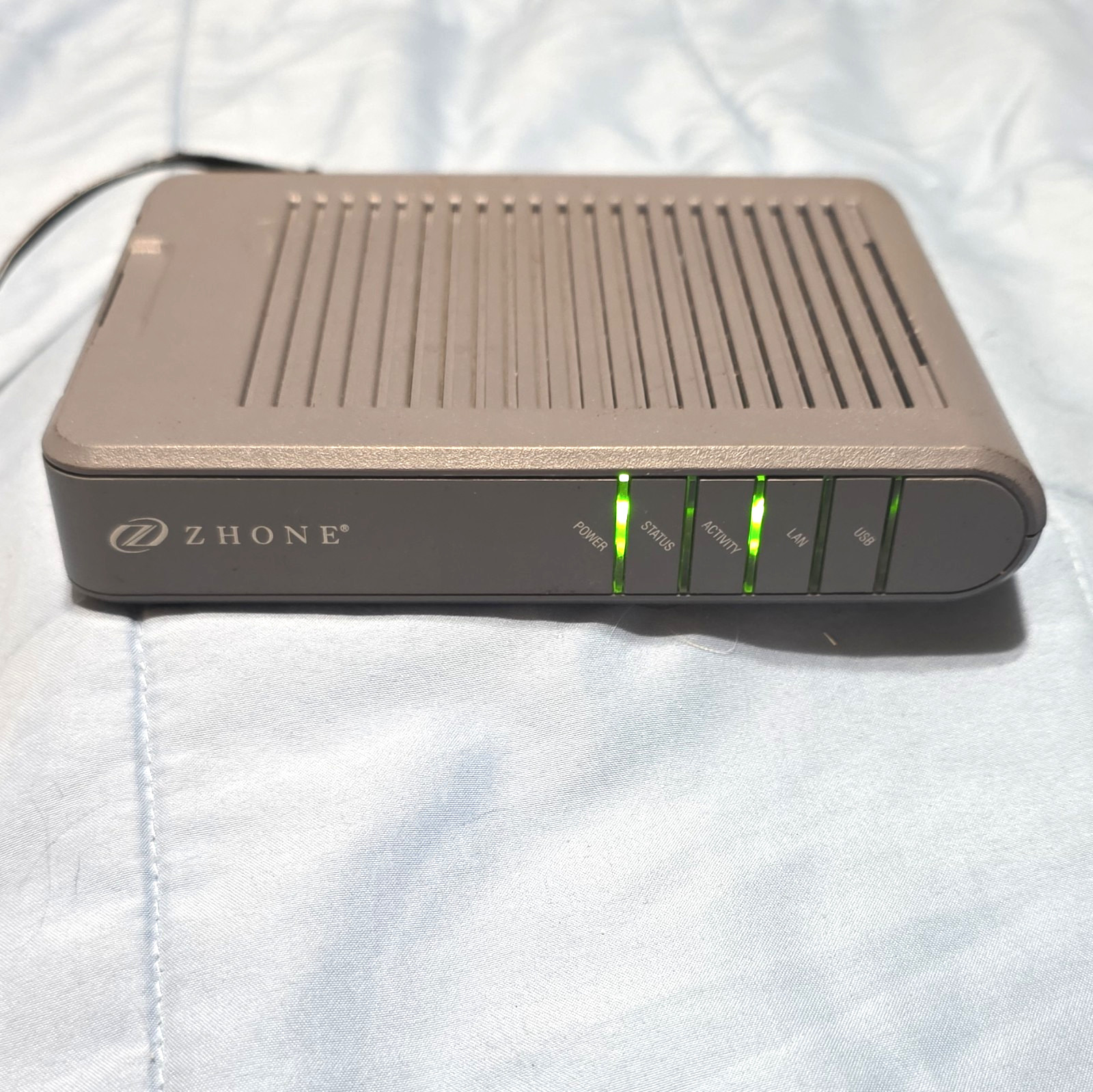 Zhone 6381-A4-200 ADSL2+ DSL Modem/Router 4 Mbps RJ11 RJ45 USB-B