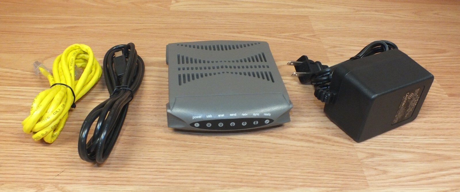 Ambit (U10C018) Lightning Fast Cable Modem With Cat 5, USB, & AC Power Supply