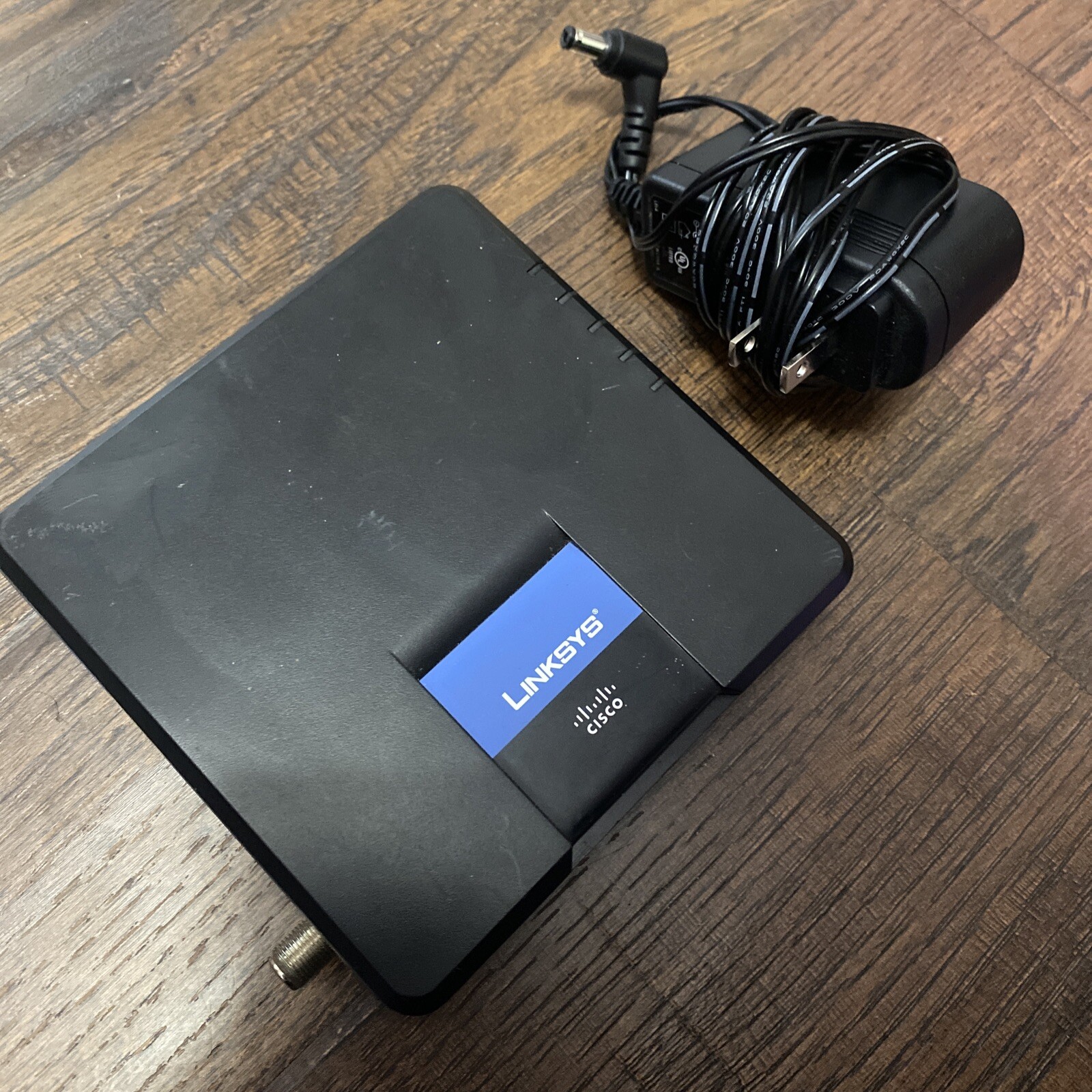 Linksys CM100 100 Mbps Cable Modem with USB, Coax and Ethernet Connections RG-6