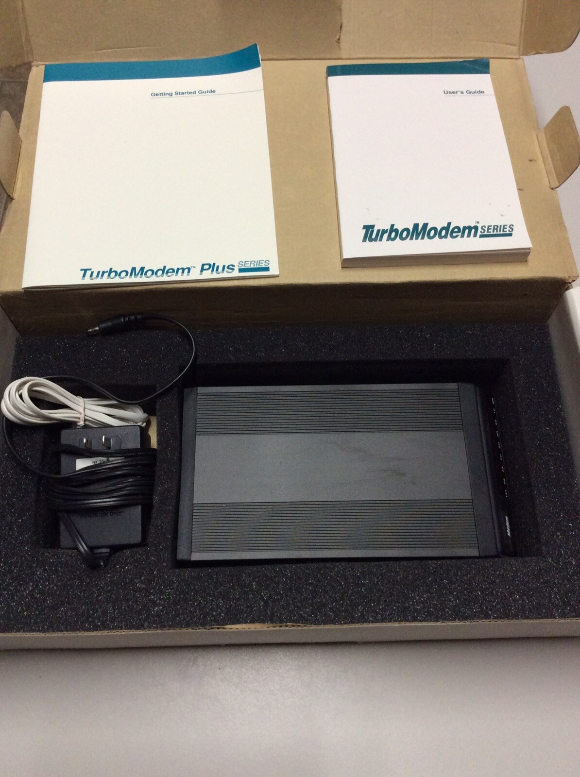 TurboModem Plus External Modem FM-144VR/1. (The Complete PC). Pre-Owned.