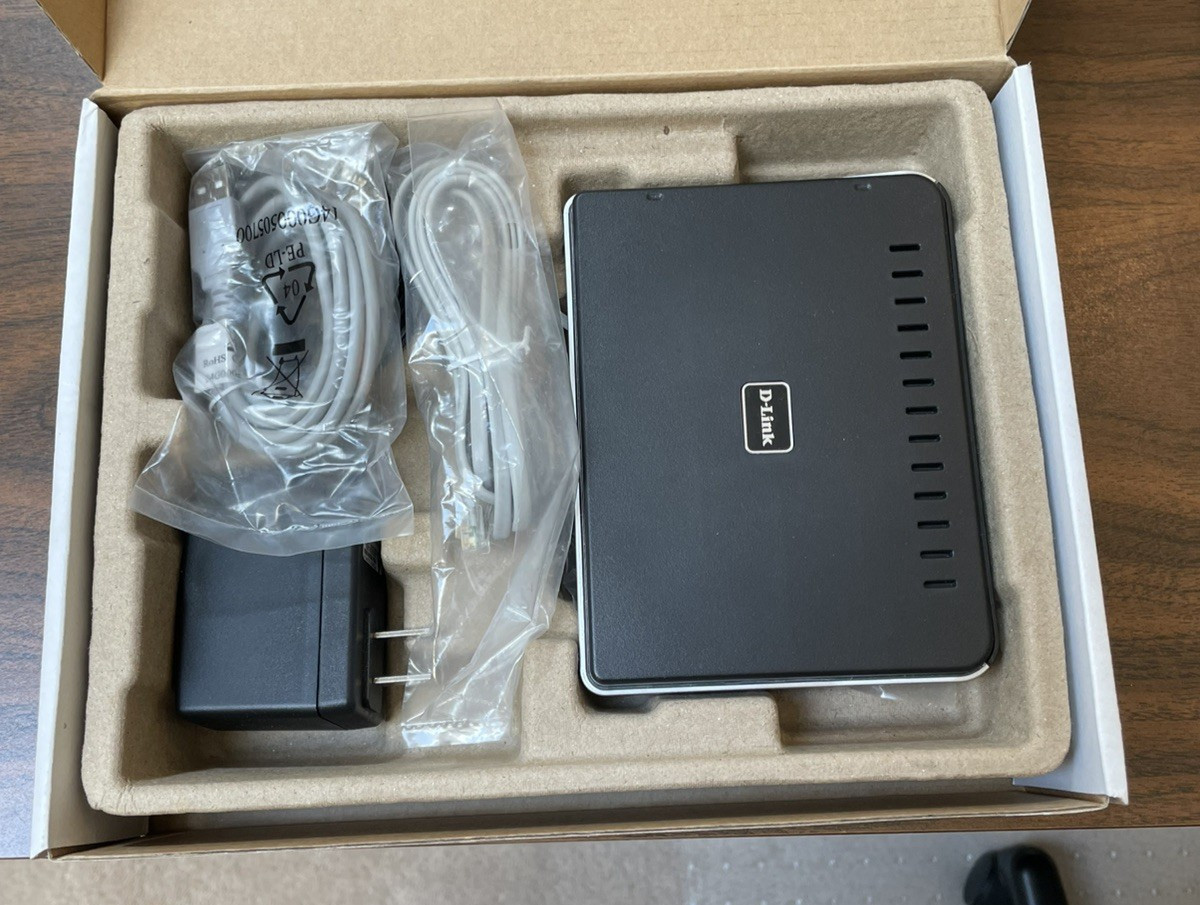 D-Link ADSL Modem Model : DSL-2320B Complete With Charger Cables Refurbished