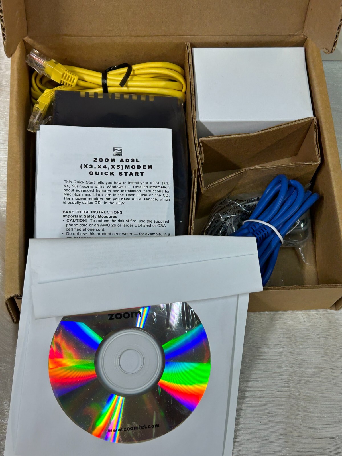 New Open Box Zoom X5 DSL 2/2+ 4-Port Ethernet Modem Model 5654 Gateway Router