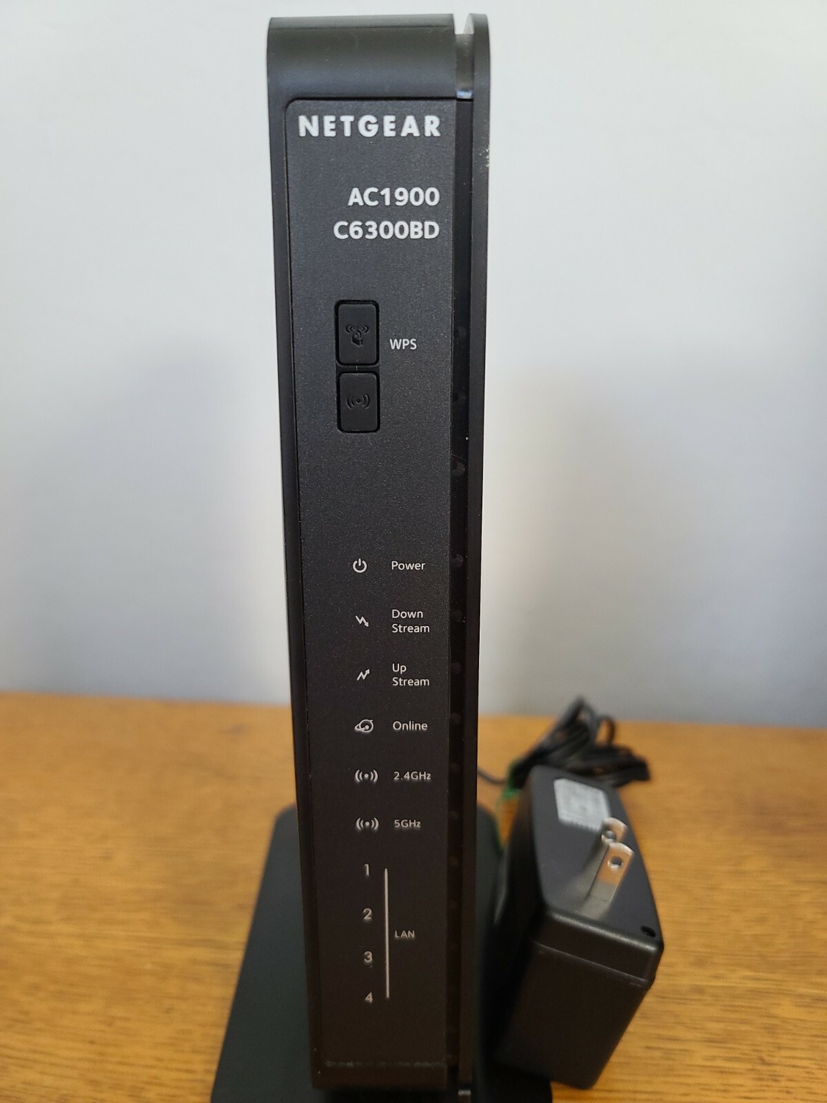 The NETGEAR AC1900 C6300BD is a cable modem router that provides high-speed