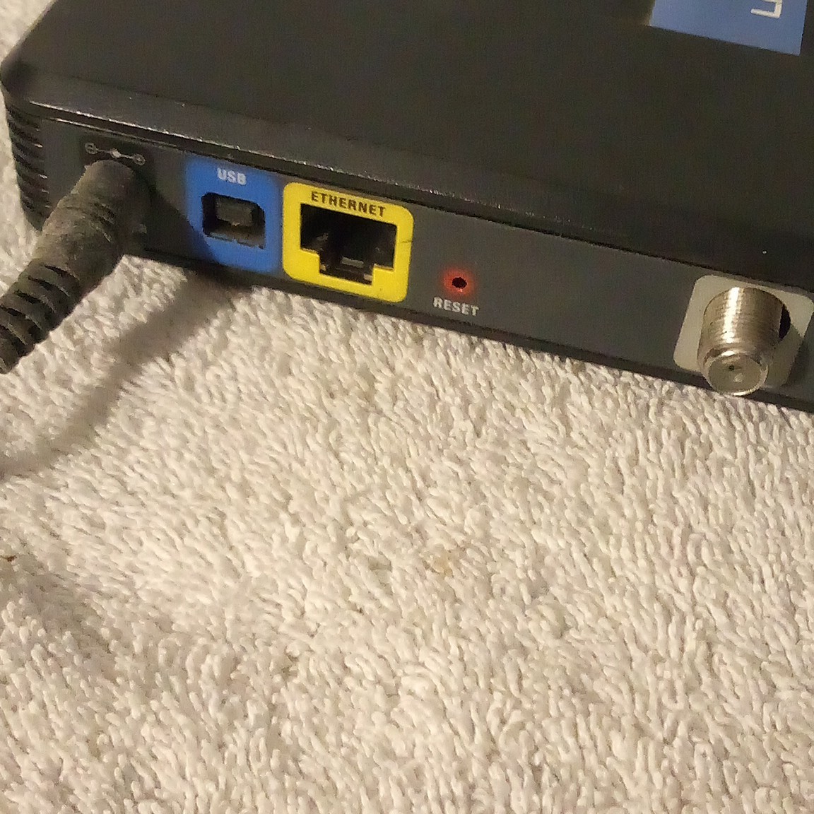 Linksys CM100 DOCSIS 2.0 Cable Modem 100 Mbps USB/Ethernet Black AD12V/1A-SW