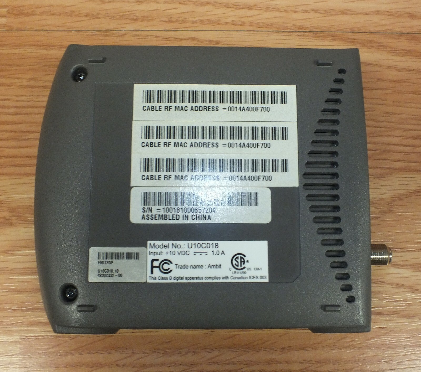 Ambit (U10C018) Lightning Fast Cable Modem With Cat 5, USB, & AC Power Supply