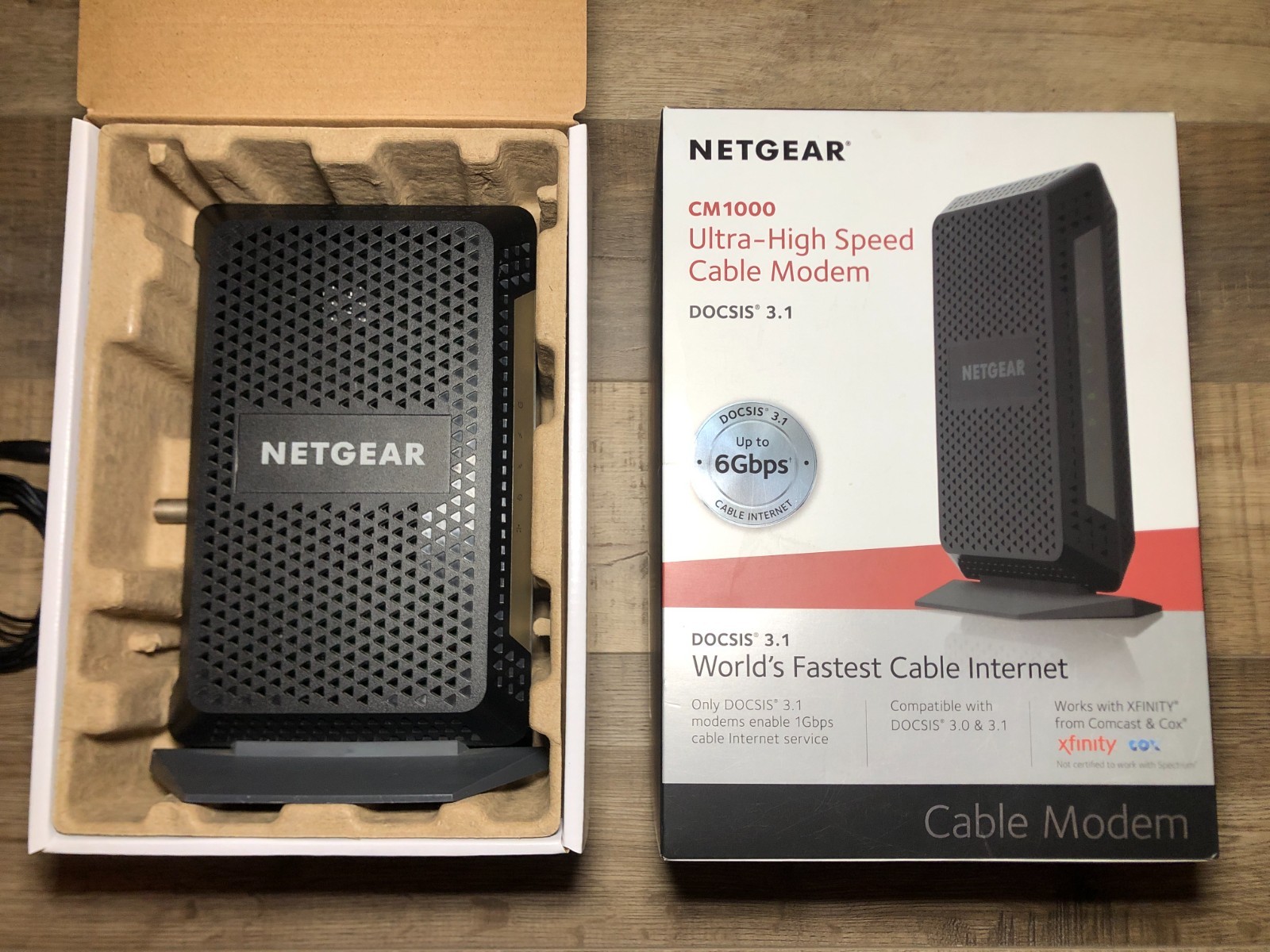 NETGEAR CM1000 1AZNAS Ultra-High Speed DOCSIS 3.1 Cable Modem with Charger & Box