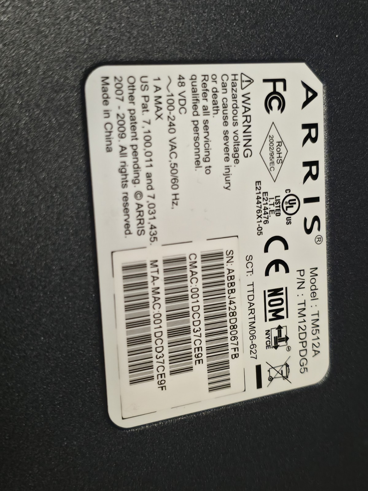 ARRIS TM512A Touchstone 12-Line EMTA Embedded Multimedia Telephony Modem