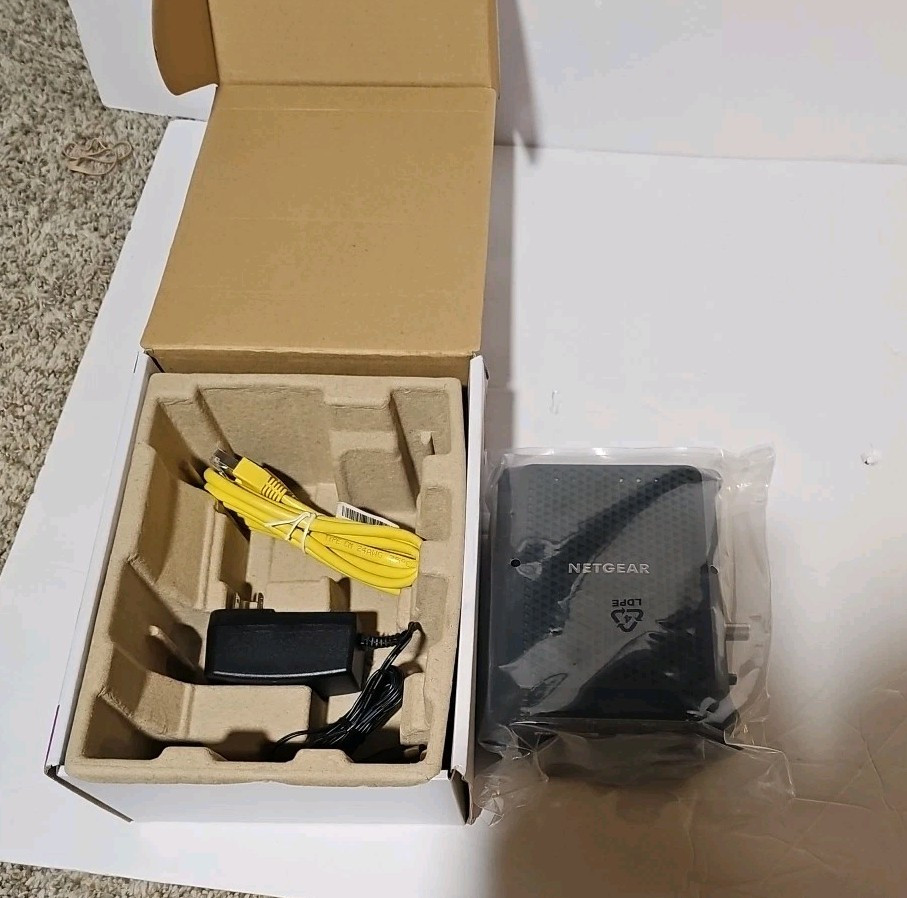 NETGEAR CM700 DOCSIS 3.0 Cable Modem in Original Box with Power Adaptor