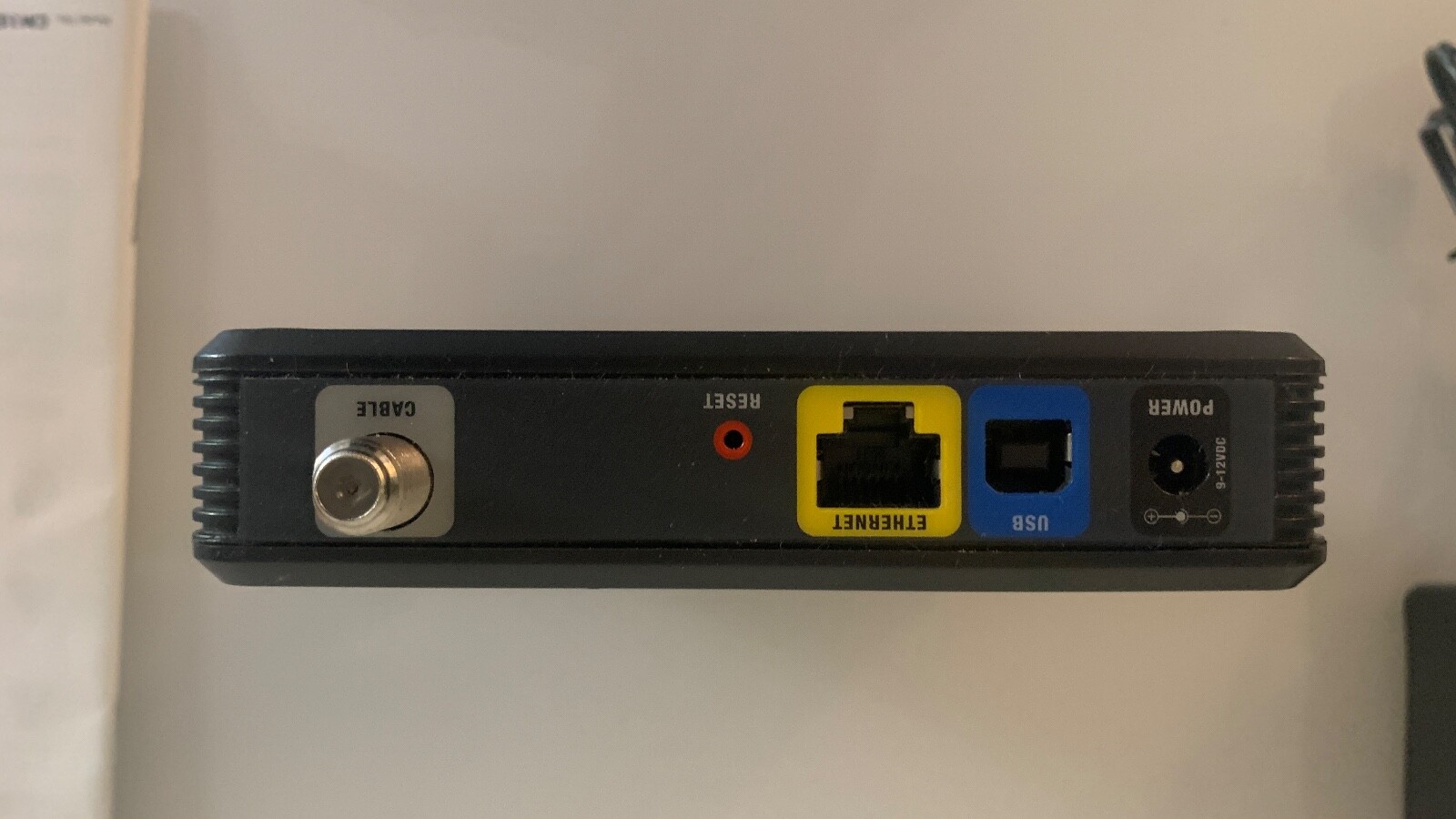 Cisco Linksys CM100 Cable Modem with power adapter, 2 manuals, CD, USB cable