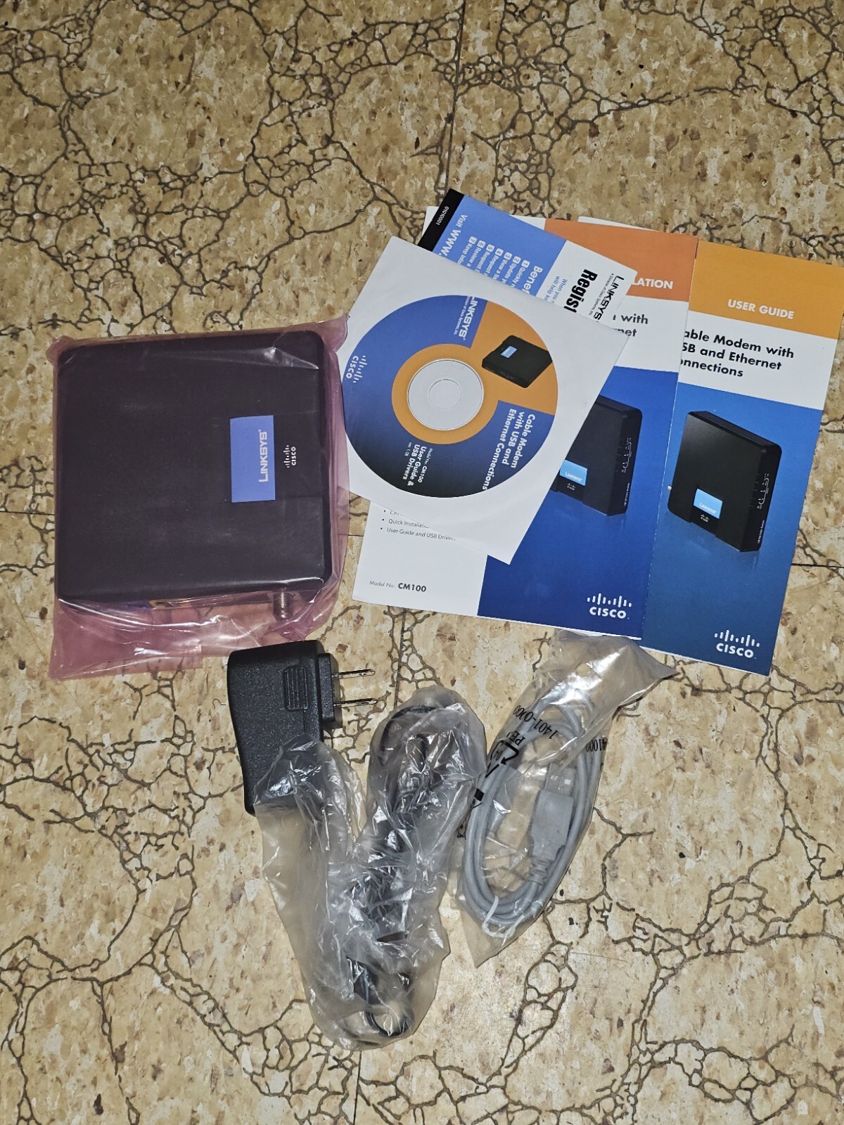 Linksys CM100 100Mbps Cable Modem with USB & Ethernet Connections