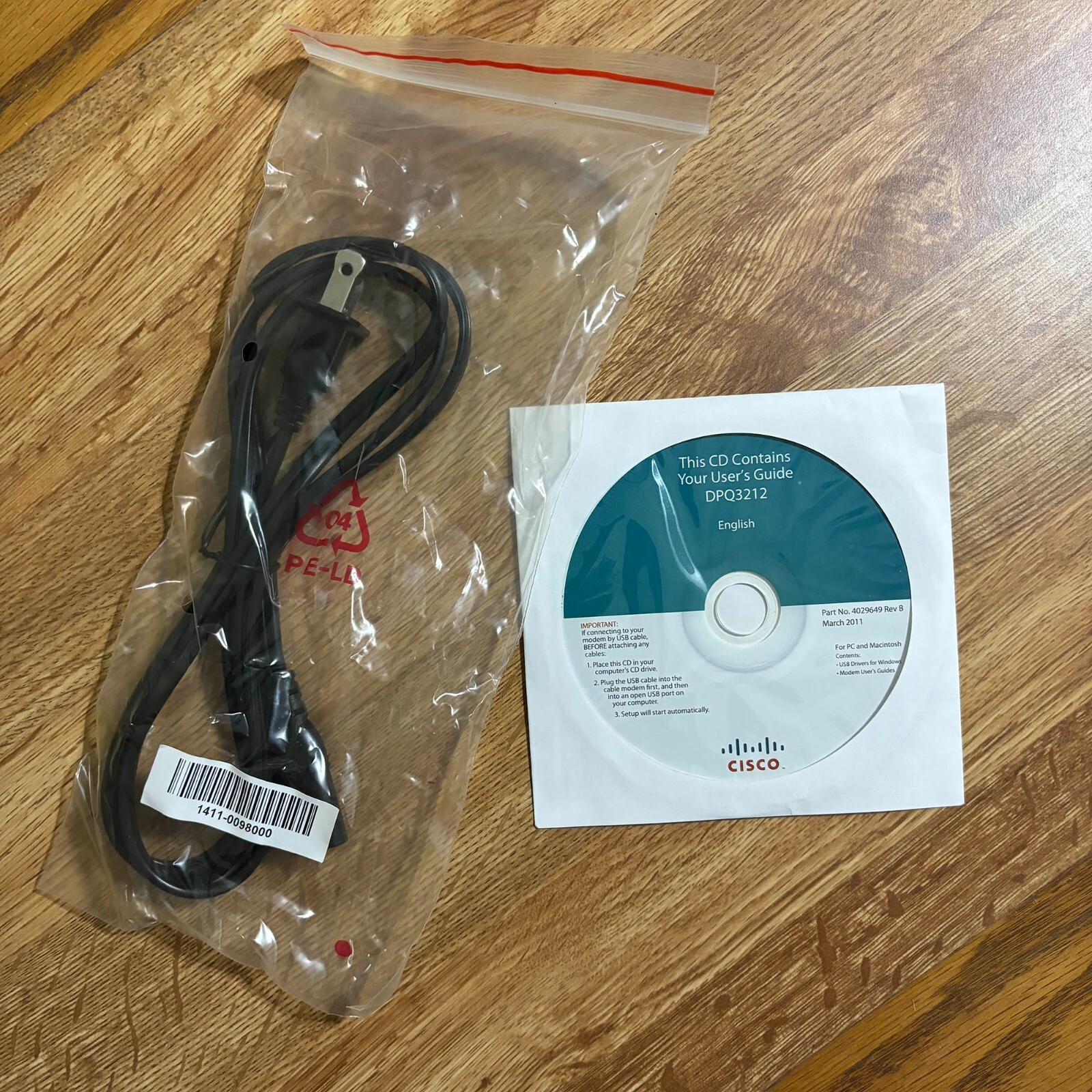 CISCO DPQ3212 Cable Modem Power Cord and User’s Guide CD 2012
