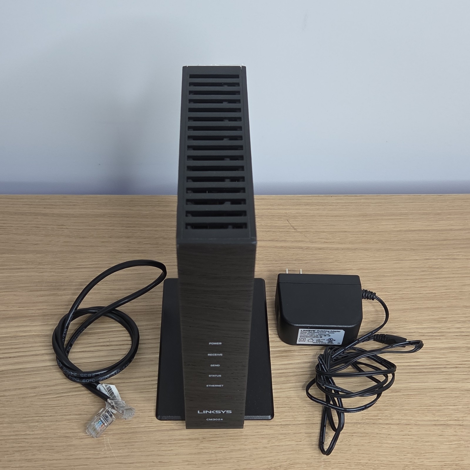 Linksys CM3024 Cable Modem Black with Power Adapter Ethernet Cable RJ-45 Port