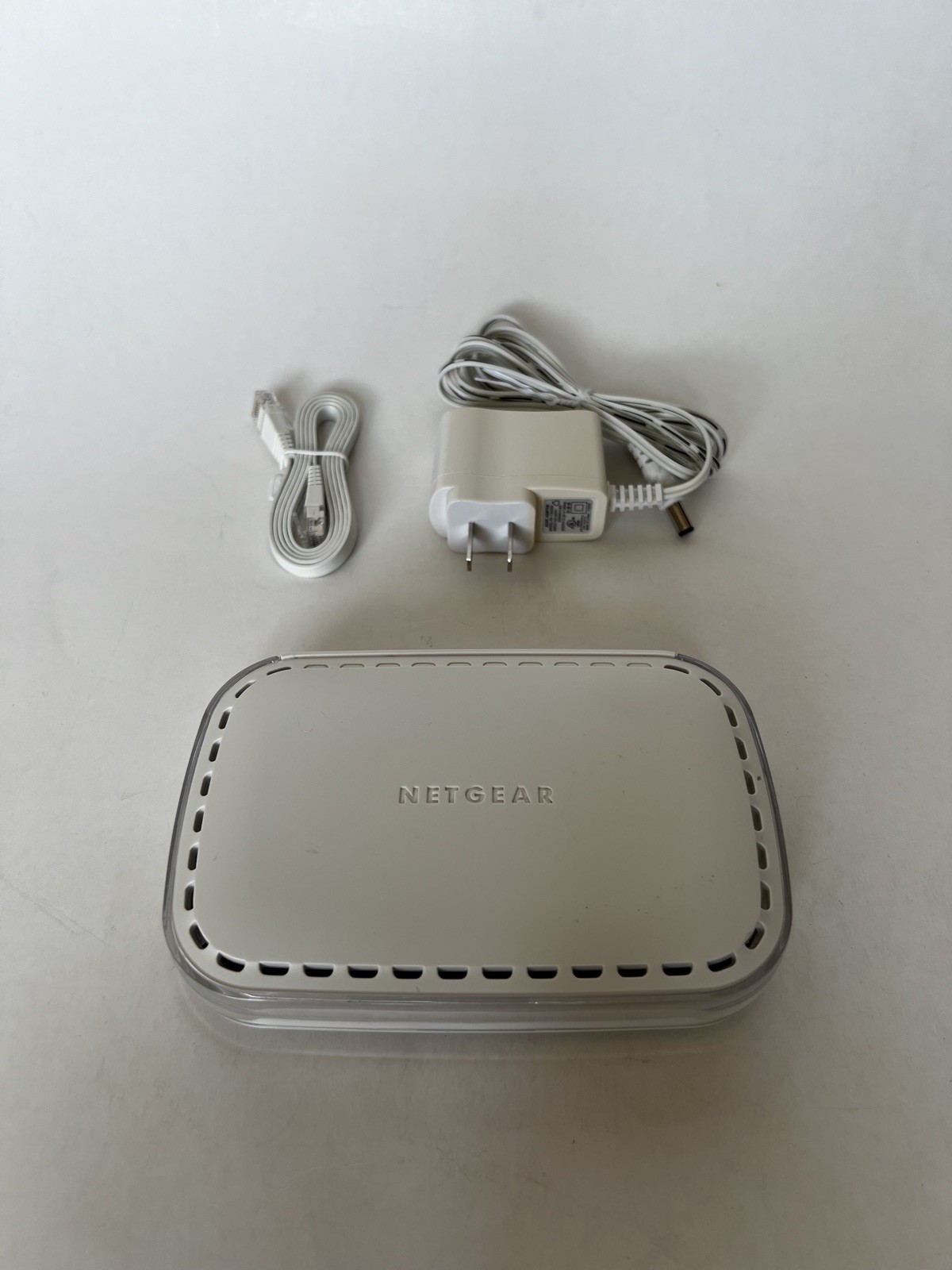 Netgear DM111PSPv2 ADSL2+ Modem with Power Adapter and Ethernet Cable