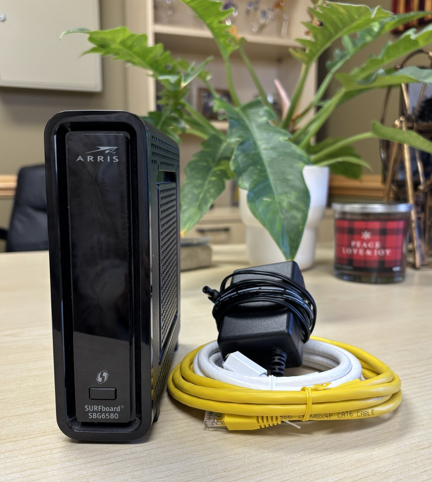 ARRIS SURFboard SBG 6580-G228 Cable Modem, Wi-Fi Router, and 4 Port Switch