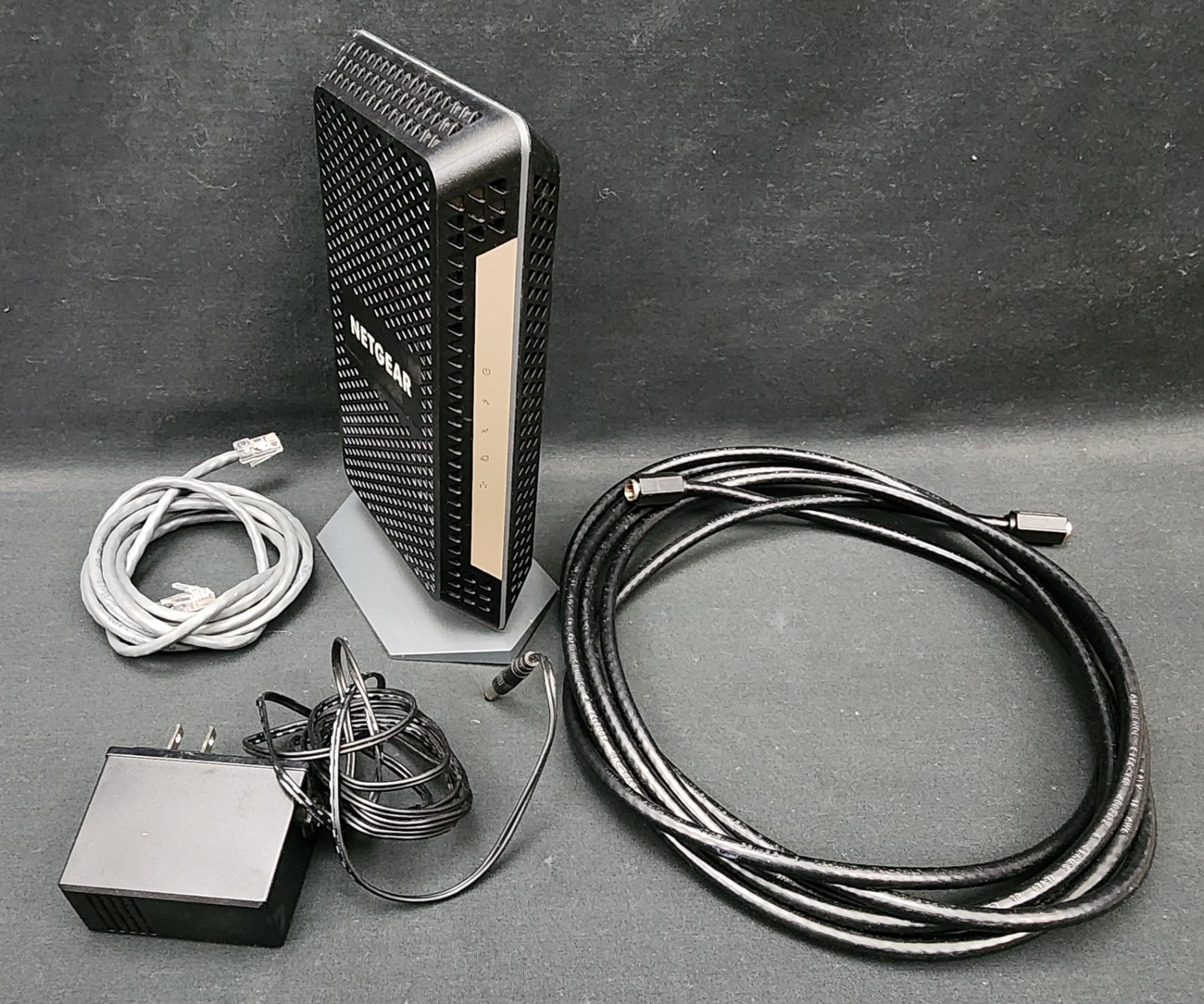 Netgear Nighthawk Model CM 1000 Cable Modem with Cords and Cables