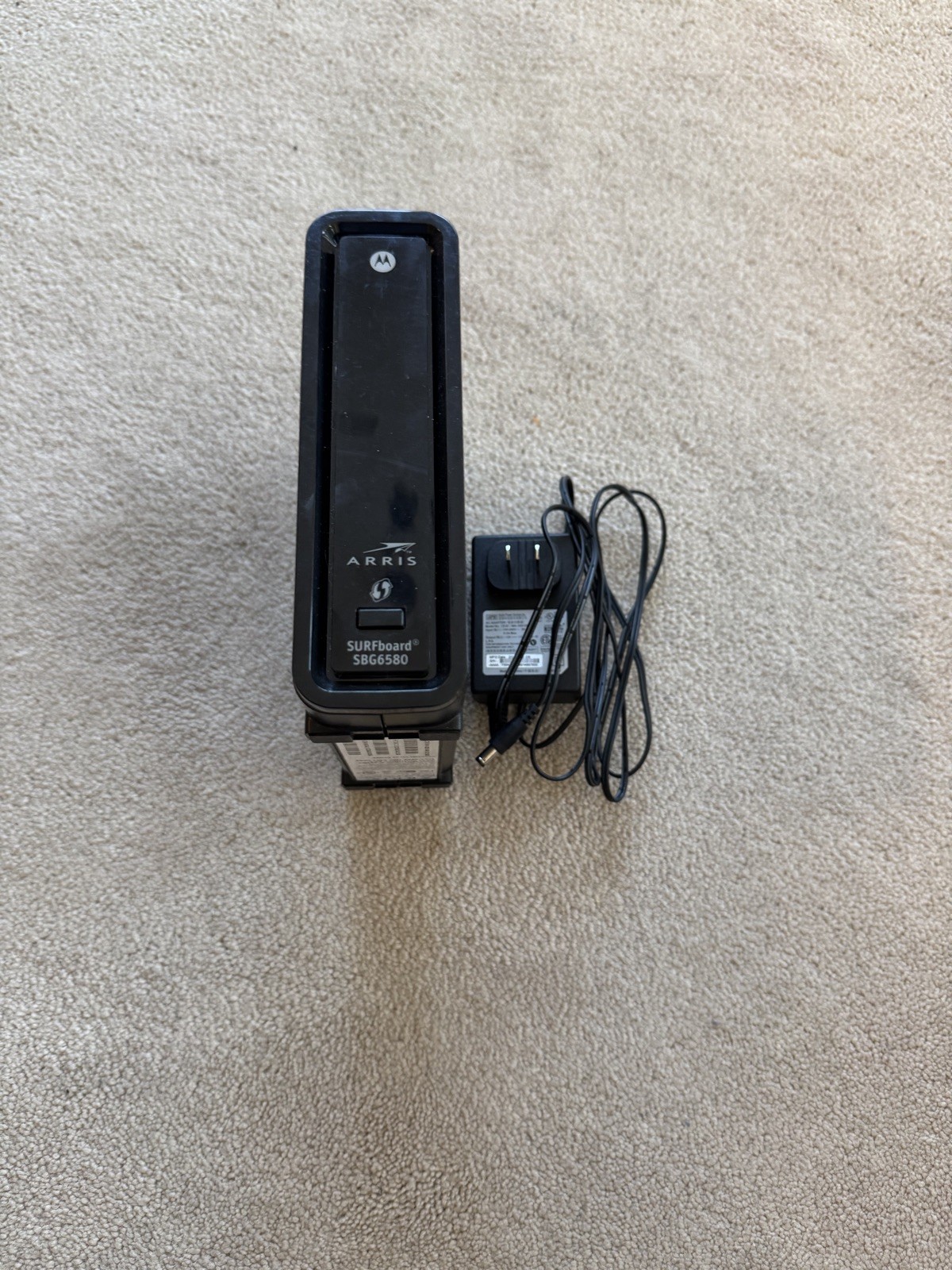 ARRIS SURFboard SBG 6580-G228 Cable Modem, Wi-Fi Router, and 4 Port Switch