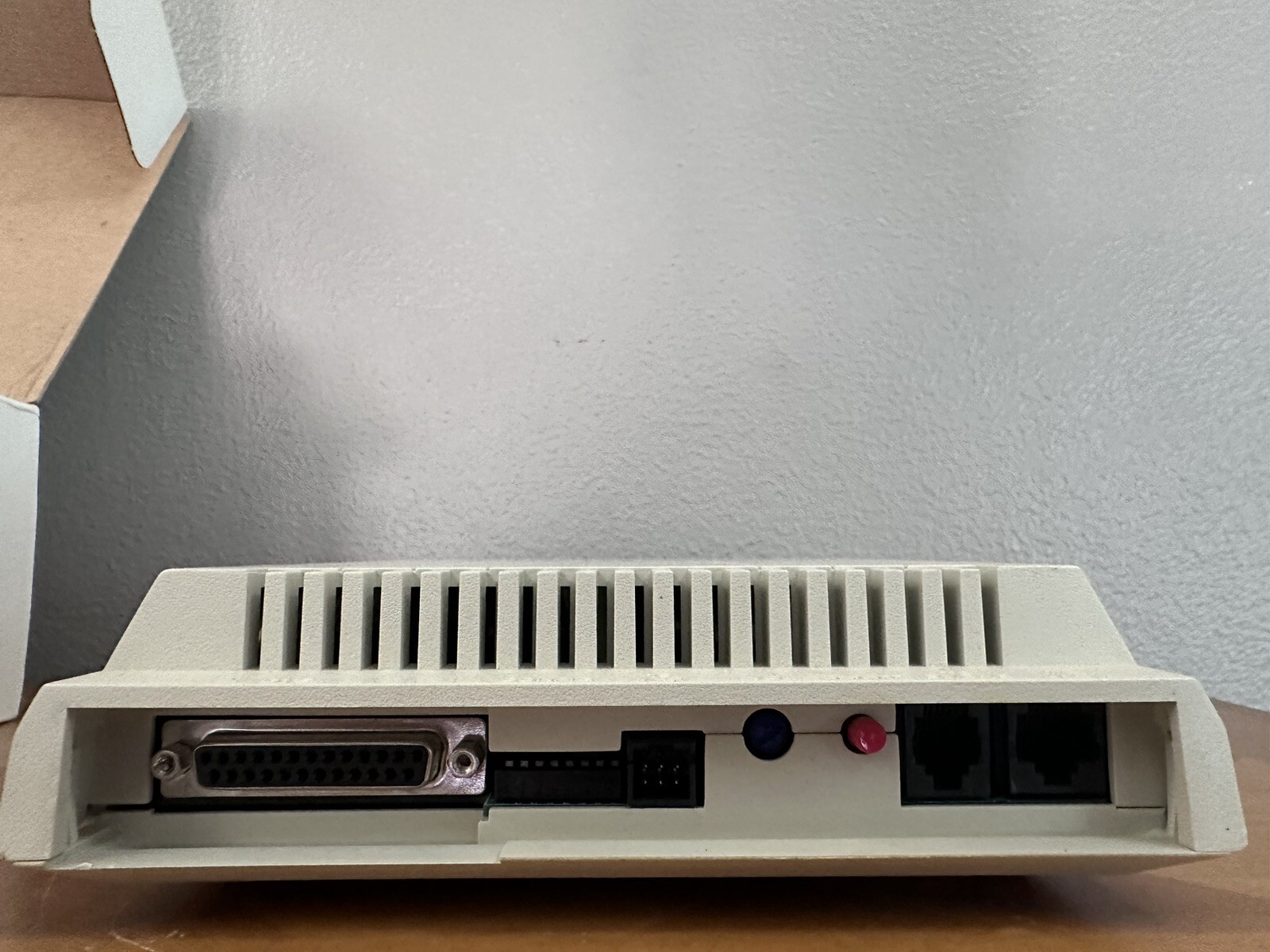 Microcom DeskPorte 14,400 bps Modem W/ Box And Charging Cord.