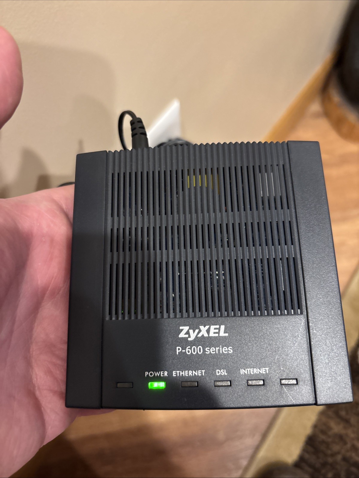 ZyXel P-600R-F1 DSL Modem with Power Cord and Ethernet Cable Powers Up