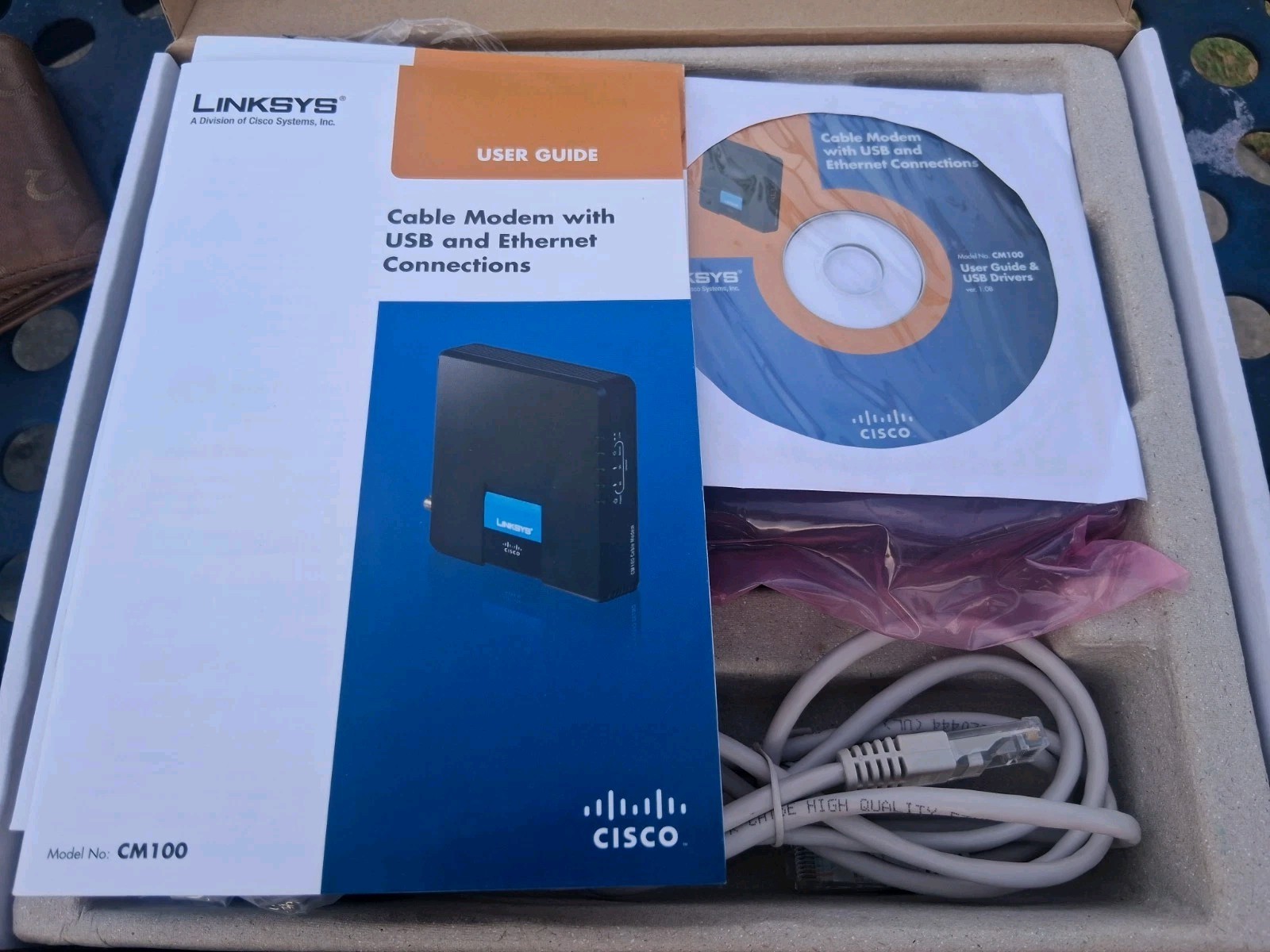 Linksys CM100 Cable Modem W/ USB & Ethernet Connections