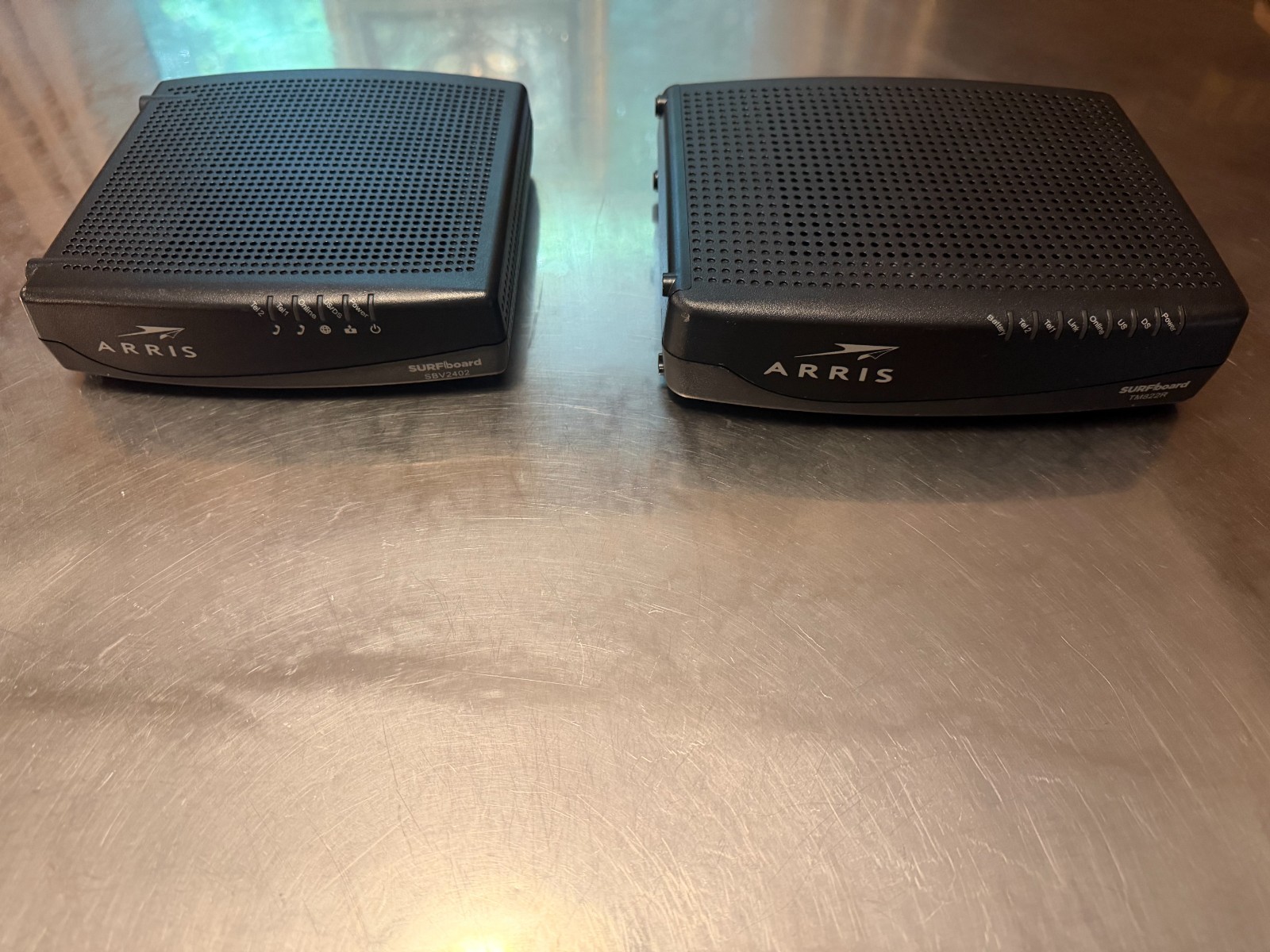 2 ARRIS Modems TM822R Internet &amp Voice DOCSIS 3.0 Modem & SV2402