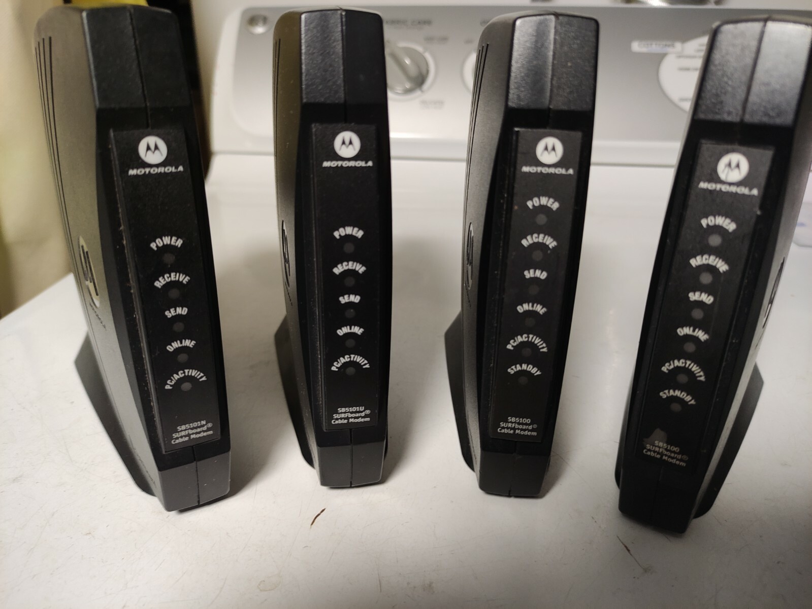 Lot of 4 Motorola cable modem selling As Is