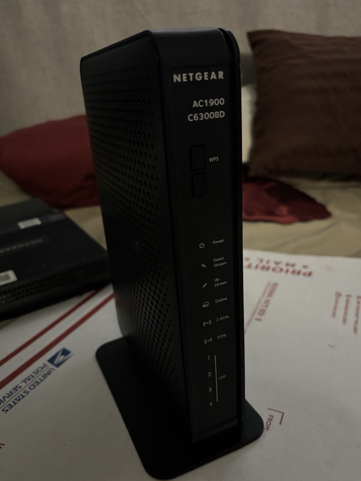 The NETGEAR AC1900 C6300BD is a cable modem router that provides high-speed