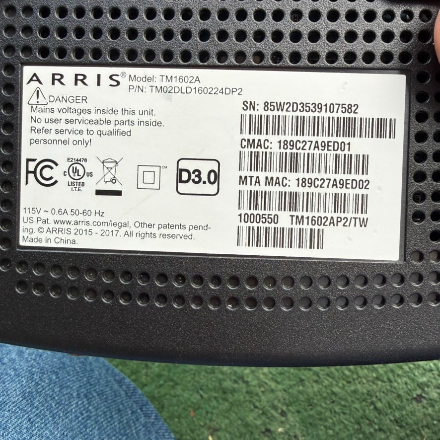 ARRIS TM1602A Cable Modem DOCSIS 3.0 with power cord.