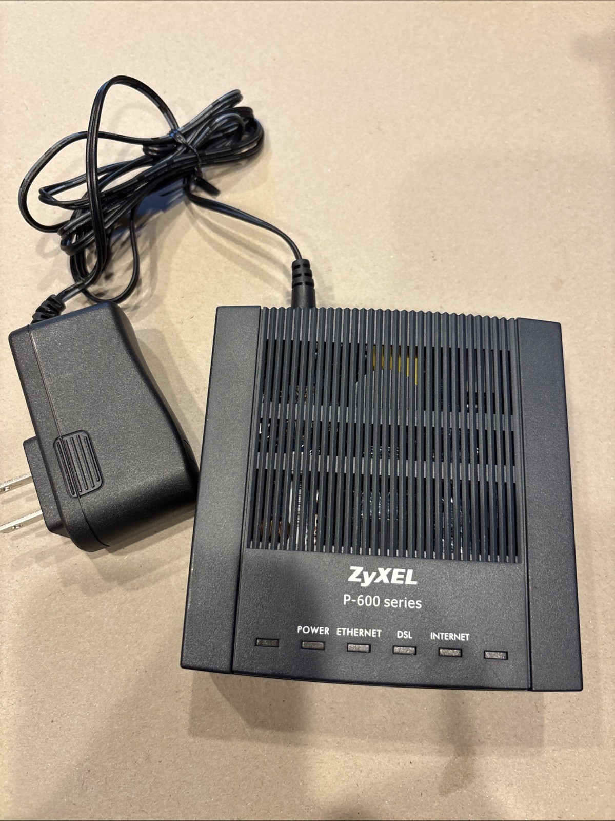 ZyXel P-600R-F1 DSL Modem with Power Cord and Ethernet Cable Powers Up