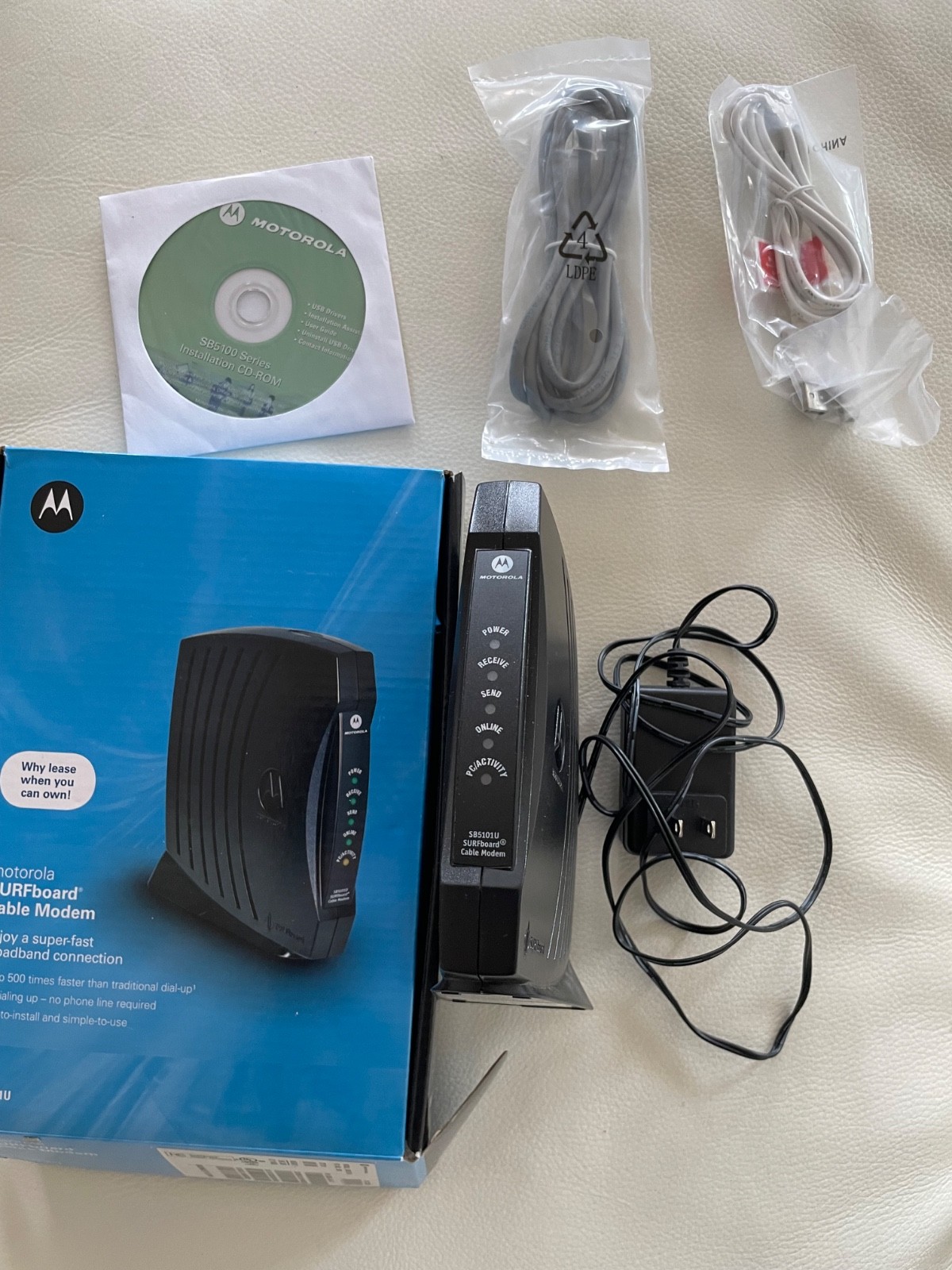 MOTOROLA Surfboard Cable Modem Model:SB5101U Cable Modem-box, disk, connectors