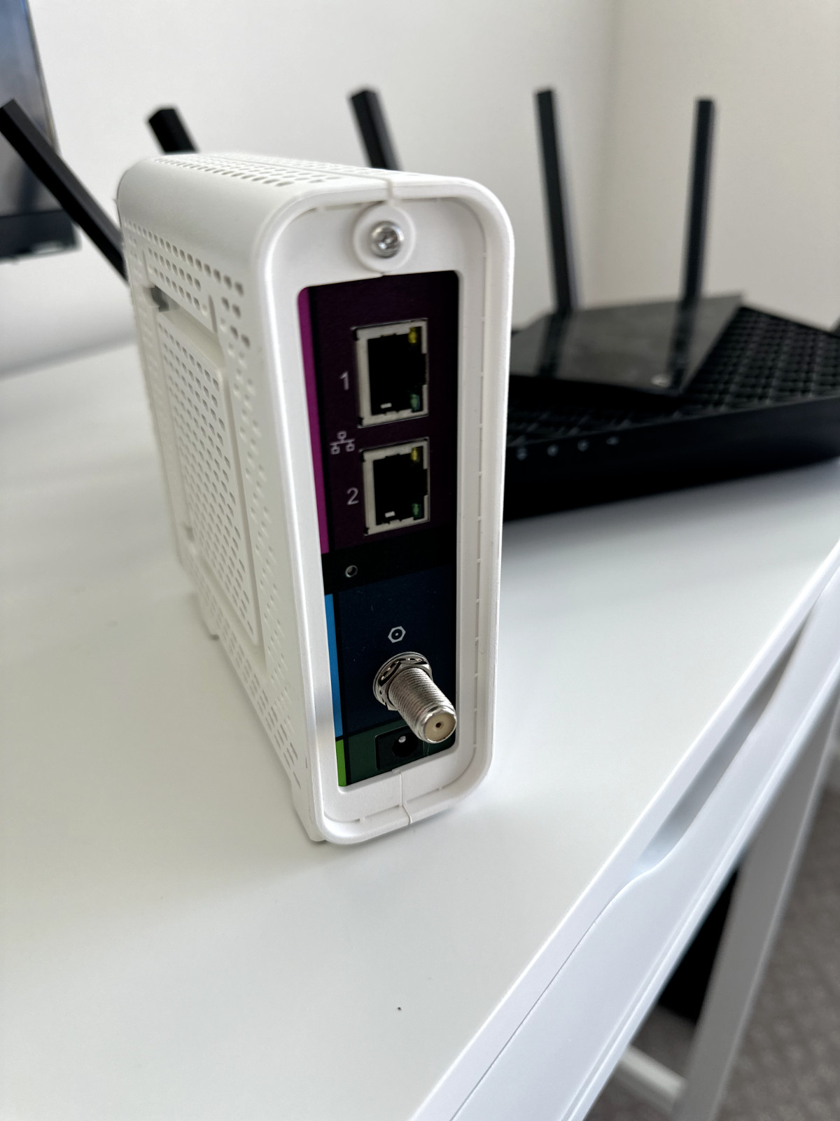 ARRIS SB8200 10 Gbps 2P Cable Modem with TP-Link AXE5400 Tri-Band WiFi 6E Router