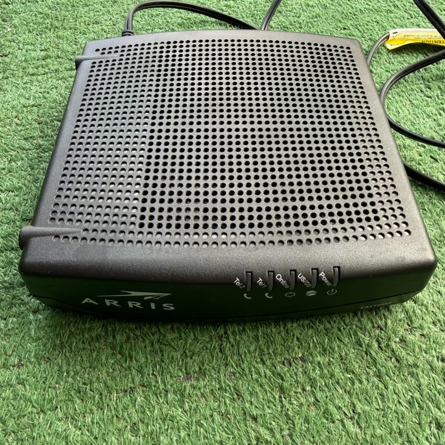 ARRIS TM1602A Cable Modem DOCSIS 3.0 with power cord.