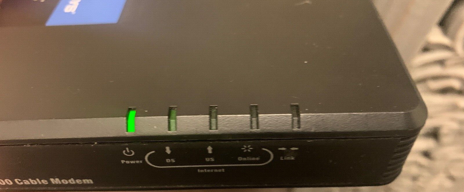 Cisco Linksys CM100 Cable Modem with power adapter, 2 manuals, CD, USB cable