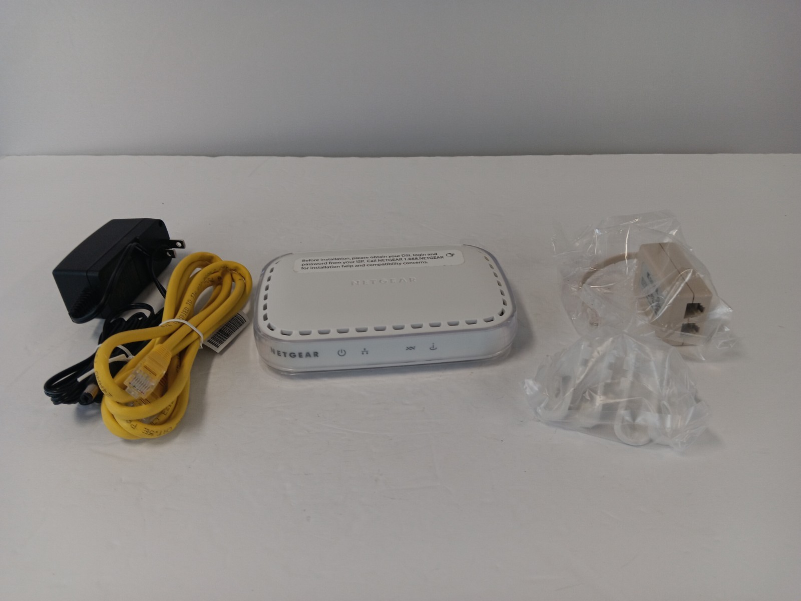 NETGEAR DM111PSP v2 Broadband ADSL2+ DSL Modem w/ Adapter & Ethernet Cable