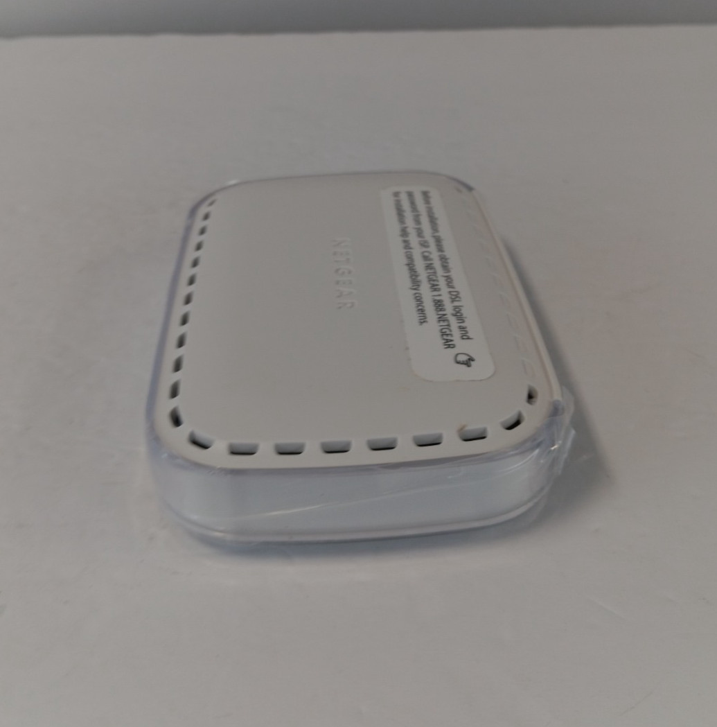 NETGEAR DM111PSP v2 Broadband ADSL2+ DSL Modem w/ Adapter & Ethernet Cable