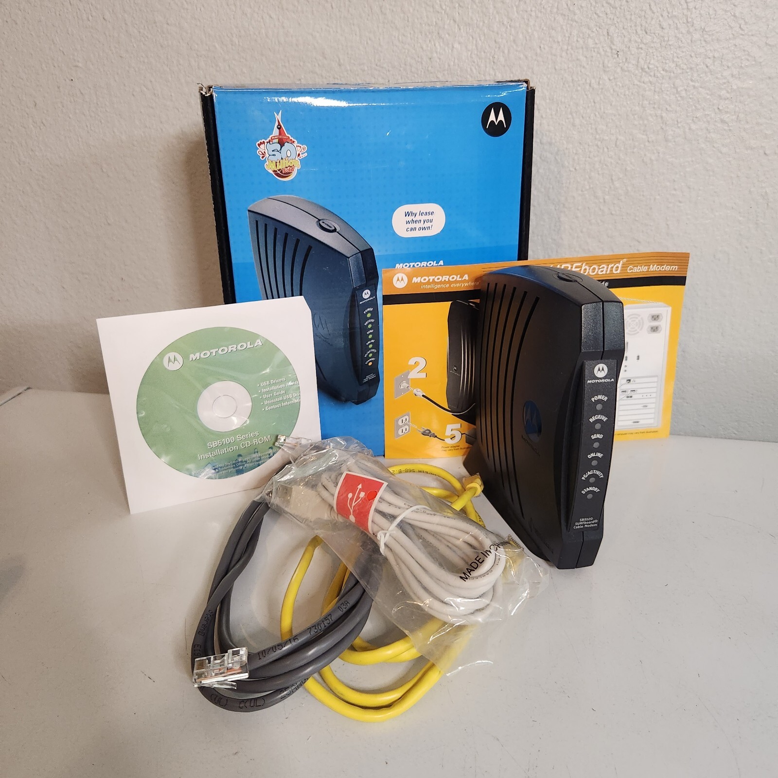 Motorola model SB5120 SurfBoard Cable Modem With Cables And Install Disc As Is