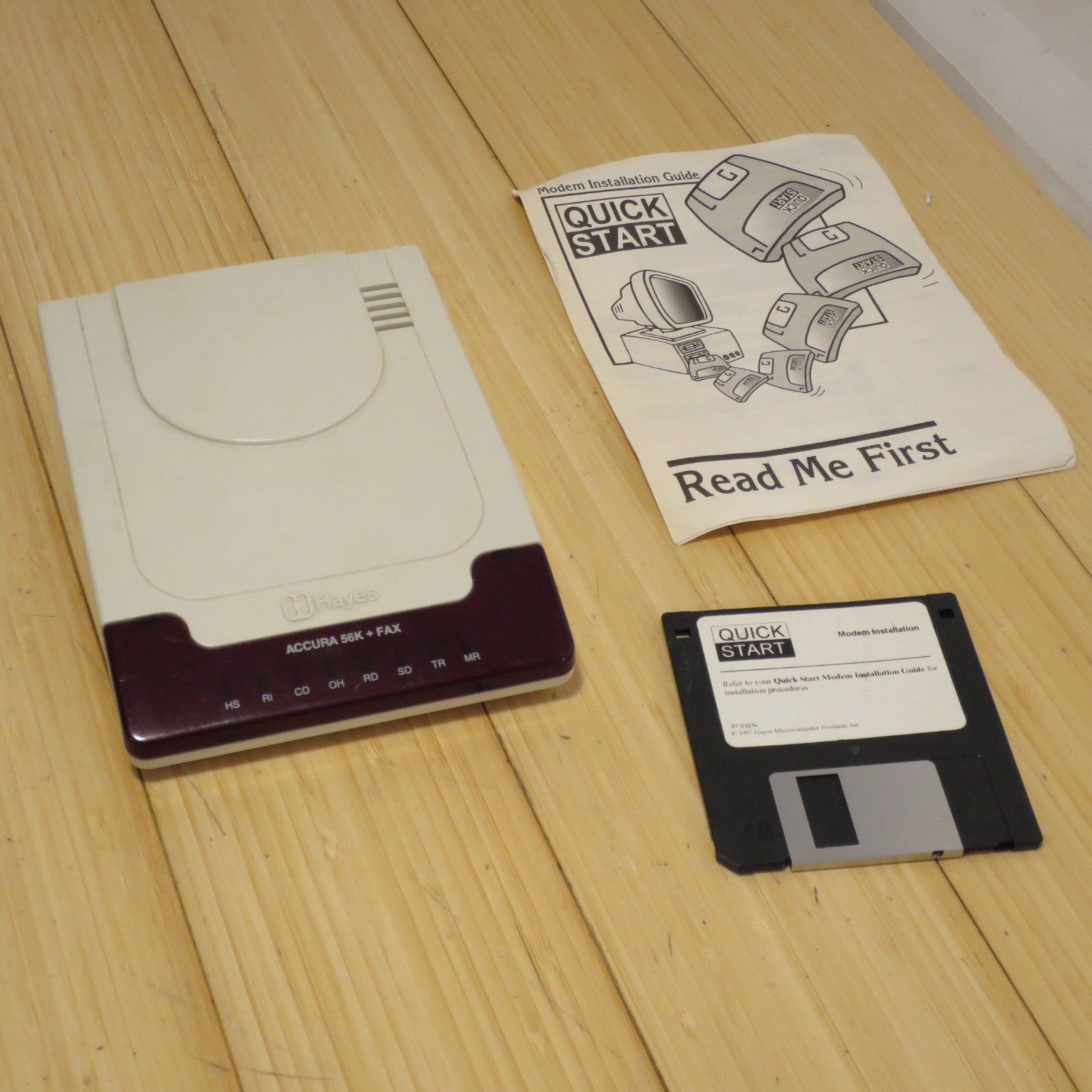 HAYES 4703US ACCURA 56K EXT FAX MODEM ACCURA 336/56K FAX (no cables)