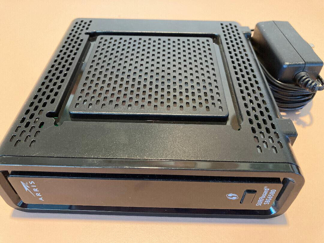 ARRIS SURFboard SBG 6580-G228 Cable Modem, Wi-Fi Router, and 4 Port Switch
