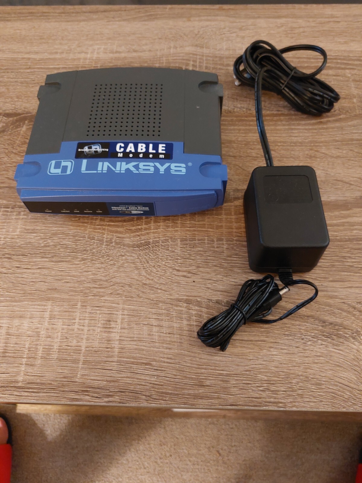 Cisco-Linksys Cable Modem and Linksys Cable / DSL Router With 4 Port Switch